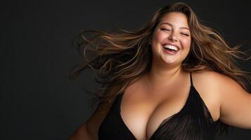 A woman with big breasts posing for the camera photo