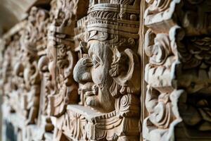 Carved wood panel of the temple of the sun god in the city of cusco, photo