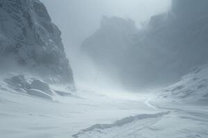 A snow covered mountain with a path leading to it photo