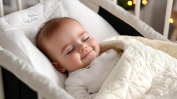 A baby sleeping in a crib with a blanket photo