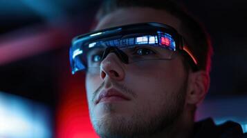 A man wearing a pair of glasses with a red light photo