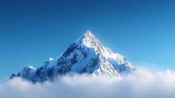 A mountain covered in snow and clouds photo