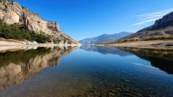 A river with a mountain in the background photo