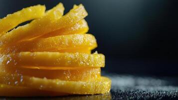 A pile of orange slices on a table photo