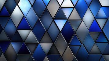 A blue and gray patterned wall with triangles photo