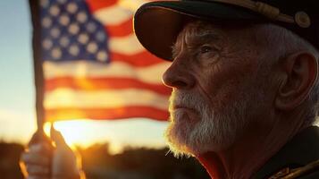 An old man wearing a hat and holding a flag photo