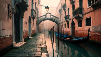Quiet morning in a Venetian canal with a lone gondola gently floating under an arched bridge photo