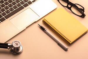 Medical stethoscope on computer keyboard photo