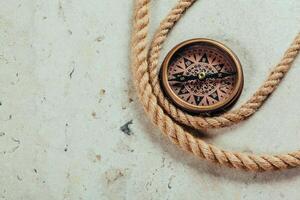 Compass on a gray gradient background photo