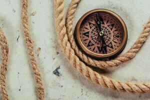 Compass on a gray gradient background photo