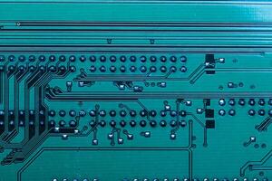 Close up of a printed green computer circuit board photo