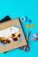 Creative scrapbook with colorful decorations and a joyful image capturing a memorable moment in nature photo