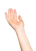 Open hand reaching out against a white background indicating readiness and openness for interaction photo
