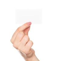 Hand holding a blank card against a white background in a close-up shot capturing the gesture of offering or presenting photo