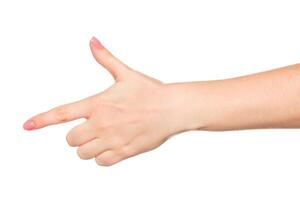 Hand gesture mimicking a gun takes center stage in a light setting during a creative exploration of body language photo