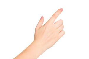 Hand pointing towards an unseen direction against a plain white background, illustrating gestures of communication or direction photo