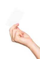 Hand holding a blank card against a plain background, suggesting creativity or waiting for a message photo