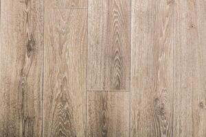 Wooden floor surface with natural grain patterns captured in well-lit indoor setting photo