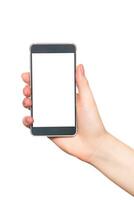 Hand holding a smartphone with a blank screen against a white background in a neutral setting photo