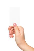 Hand holding a blank card in a neutral setting for creative word or message display photo