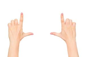 Hands forming a rectangular frame to signify focusing on a subject indoors during daytime photo
