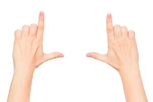 Hands forming a frame gesture with fingers extended, ready to capture a scene or focal point in an unobstructed space photo