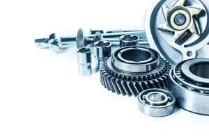 Assorted mechanical components arranged on a light background highlighting their intricate design and functionality photo