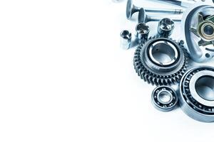 Mechanic workshop display featuring various engine parts and tools often used in automotive repairs or maintenance photo