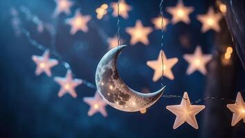 String lights featuring a crescent moon and stars create a magical atmosphere at night photo