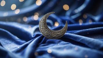 Intricate crescent moon design on blue fabric with sparkling lights creating a serene atmosphere photo