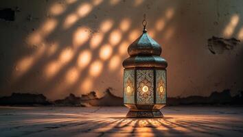 Decorative lantern casting intricate shadows in an old, rustic room during evening light photo