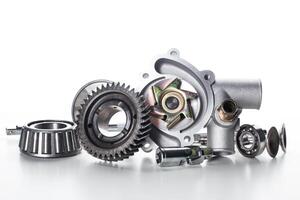 Collection of automotive mechanical components displayed artfully on a light background photo