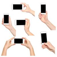 Different hand positions holding smartphones against a white background showcasing various grips and angles photo