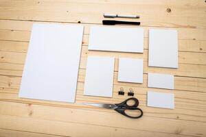 Craft materials arranged neatly on a wooden table for creative projects and DIY tasks photo