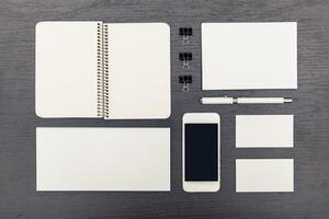 Workspace setup with blank stationery and a smartphone ready for organization and creativity photo