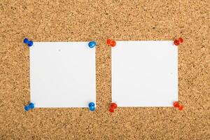 Corkboard display with blank notes pinned in a creative workspace setting photo