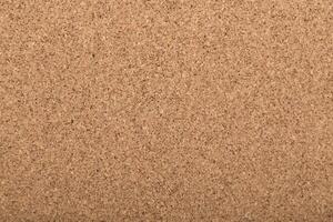 Cork board with a smooth texture in a neutral color, perfect for pinning notes and reminders photo