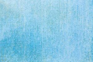 Textured blue background with subtle variations in tone and appearance creates a calming ambiance perfect for art or design projects photo