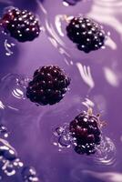 Blackberries in water with bubbles photo