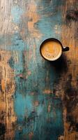 Coffee cup on wooden table top view photo
