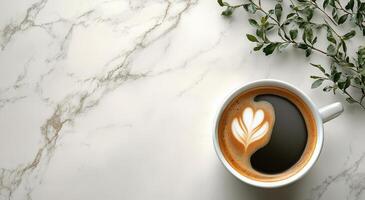 Coffee with yin yang symbol on white marble background photo