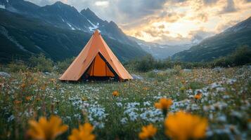 A tent is set up in a field with flowers photo