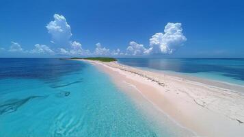 An aerial view of a sandy beach and blue water photo