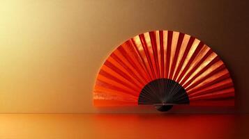 A red and black fan sitting on a table photo