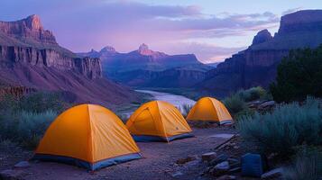 A group of tents set up on a rocky trail photo