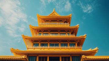 A tall building with a golden roof photo