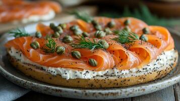 A plate topped with smoked salmon and cream cheese photo