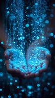 Hands holding glowing blue light in the air photo