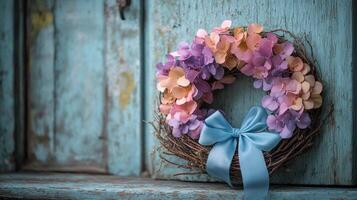A wreath with flowers on a wooden door photo