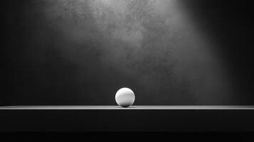 An egg sitting on a table in front of a wall photo